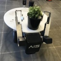 AIS BigTop robot transporting a plant in a plant nursery.