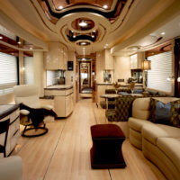 Interior view of living area in Newell Coach RV with aftermarket slideouts.