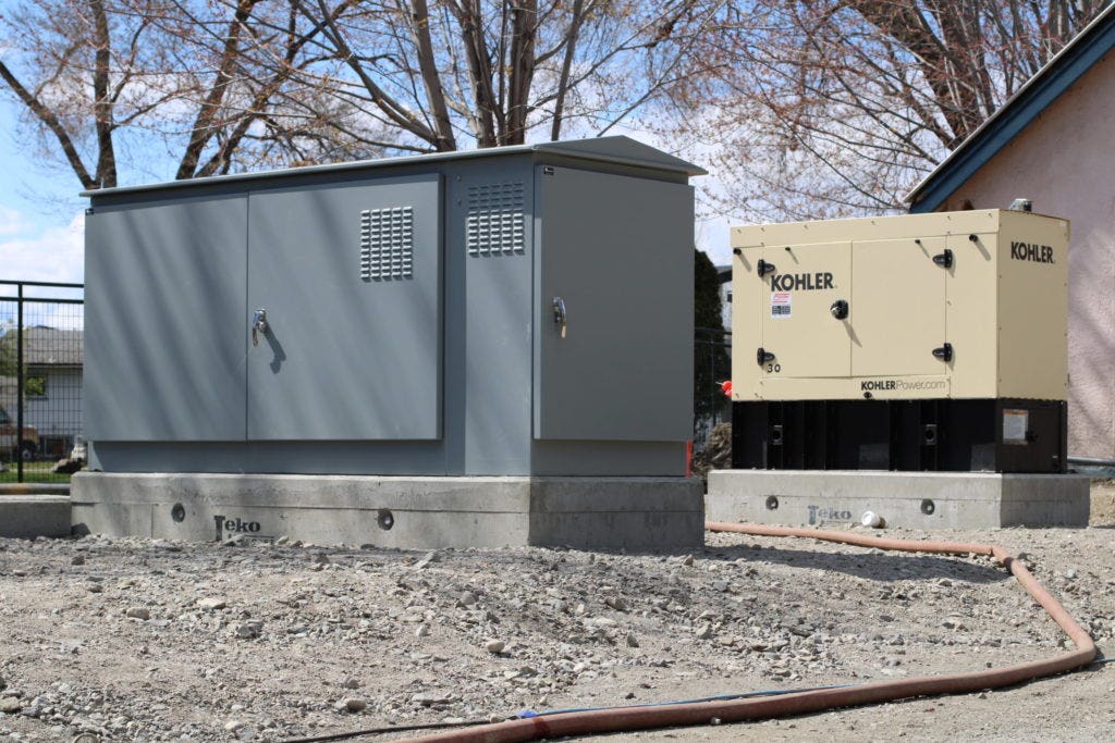 Valid Wastewater Lift Station Kiosk on a cement base.